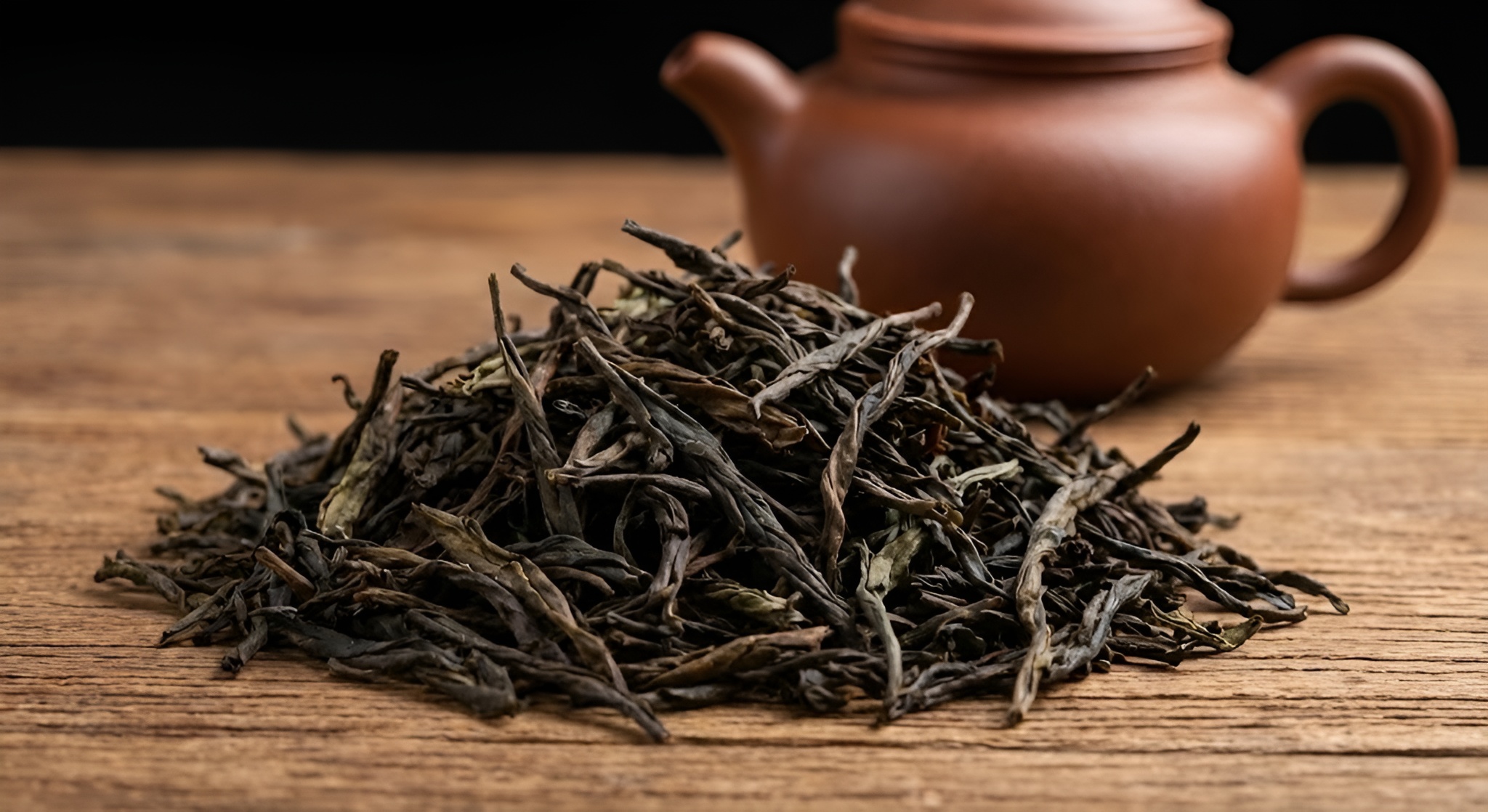 A beautiful, lush green tea terrace cascading down a mountainside.