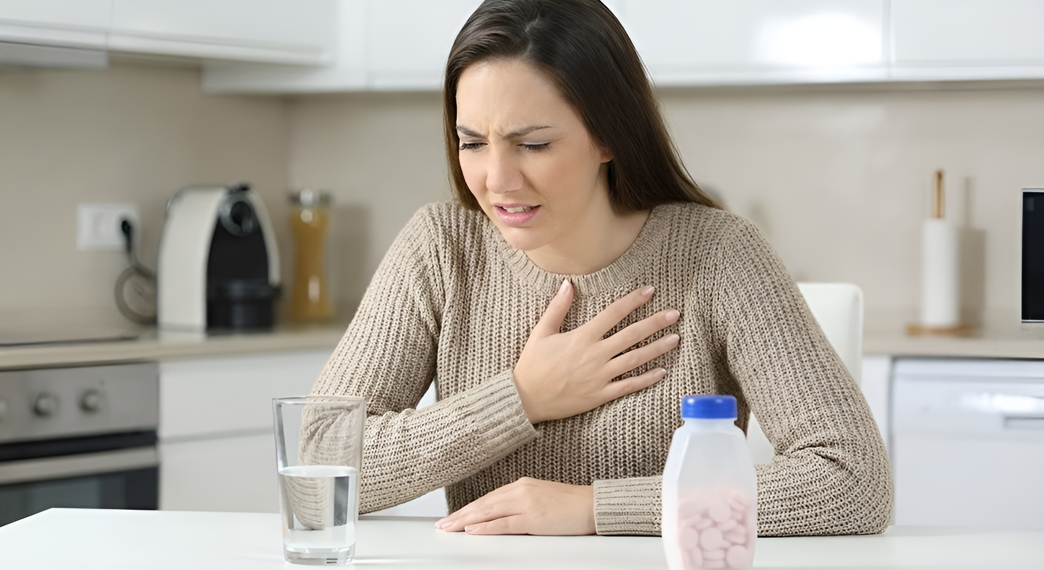 A soothing cup of chamomile tea next to fresh ginger root and licorice.