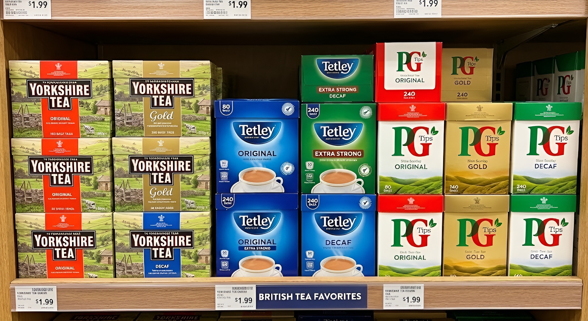 Boxes of Yorkshire Tea, Tetley, and PG Tips stacked on a kitchen counter with mugs of tea.